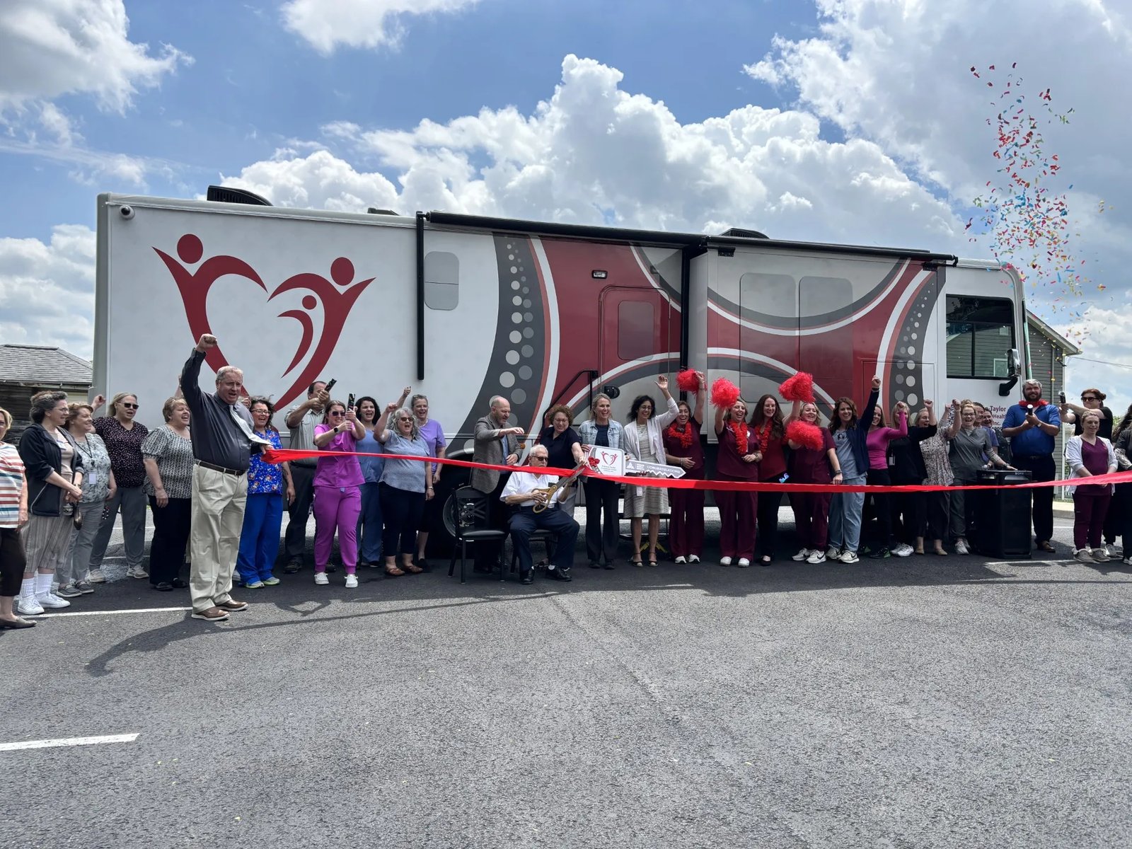 Community ribbon-cutting celebration launching a new Mission Mobile Medical clinic
